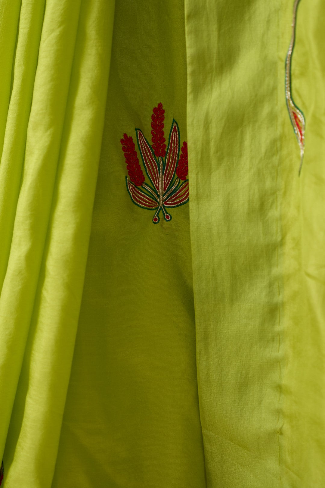 Lime green silk jaal embroidered saree comes with an organic cotton petticoat (02 Pcs.)