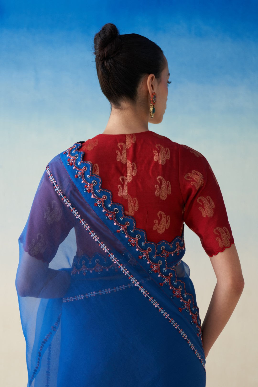 Midnight blue organza embroidered saree comes with an organic cotton stitched petticoat (02 pcs.)