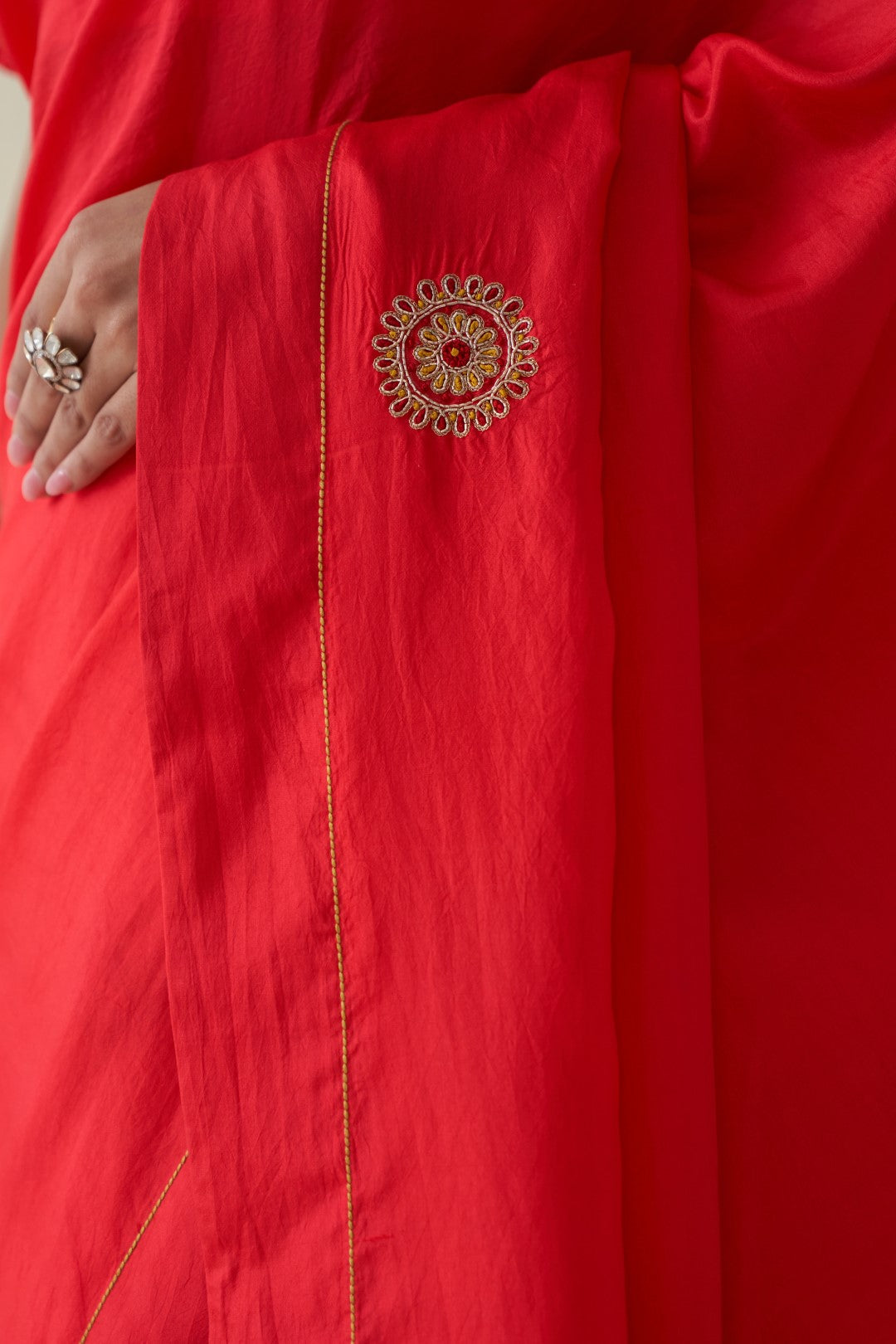 Red silk embroidered motifs saree comes with an organic cotton stitched petticoat (02 Pcs.)